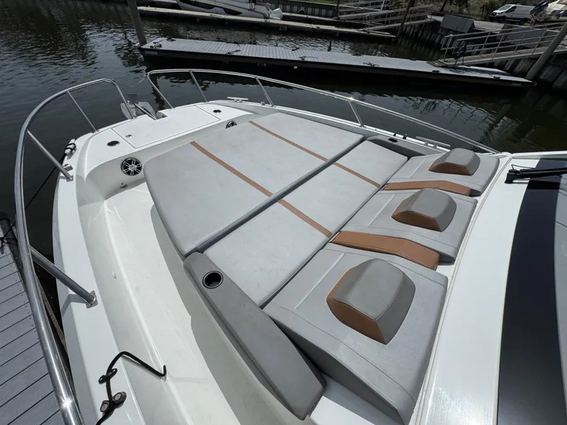Slide: The Image of 2022 Beneteau Gran Turismo 32 boat with spacious sunbathing area and comfortable seating. - 12