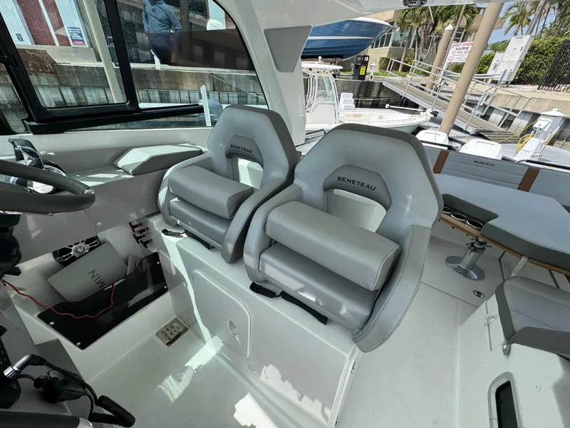 Slide: The Image of Interior of 2022 Beneteau Gran Turismo 32 yacht with modern seating and helm. - 20