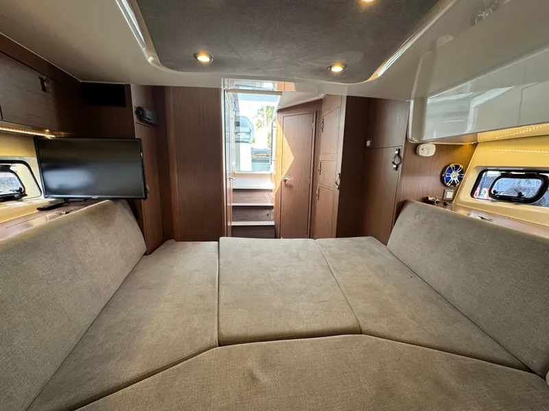 Slide: The Image of Interior of 2022 Beneteau Gran Turismo 32 yacht with cozy seating and modern amenities. - 29