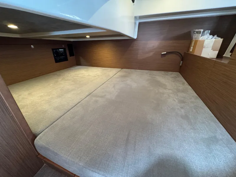 Slide: The Image of 2022 Beneteau Gran Turismo 32 cabin interior with spacious bed and modern design. - 31