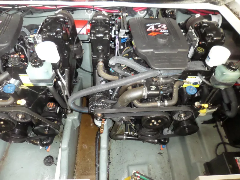 Slide: The Image of Engine compartment of 2003 Sea Ray 280 Sundancer with twin MerCruiser 4.3L engines. - 36