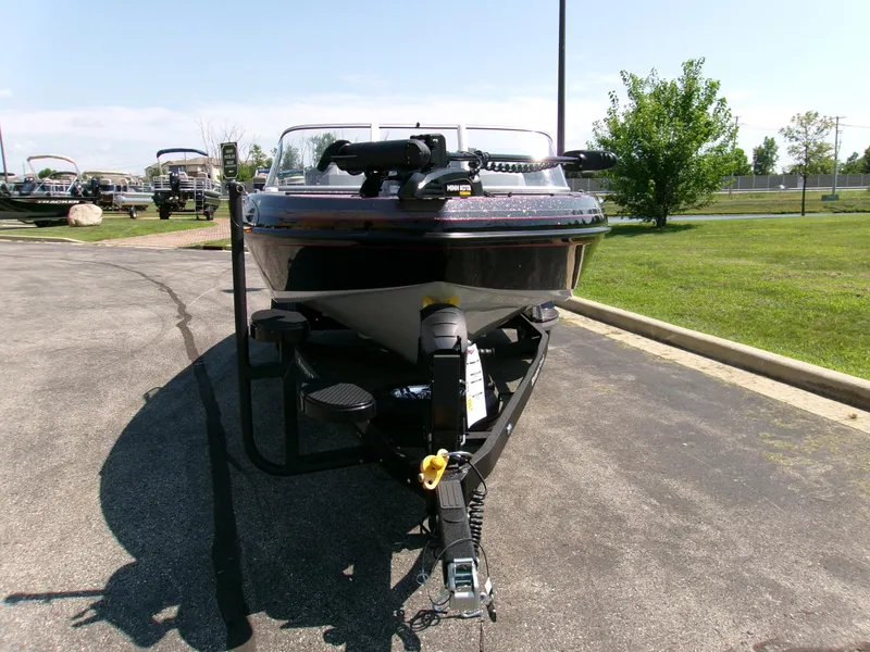 Slide: The Image of 2025 Ranger 1880MS boat on trailer in outdoor setting, front view. - 2