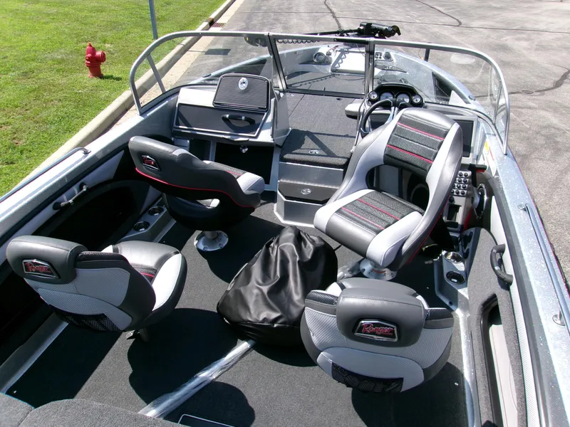 Slide: The Image of 2025 Ranger 1880MS boat interior with modern seating and dashboard design. - 4