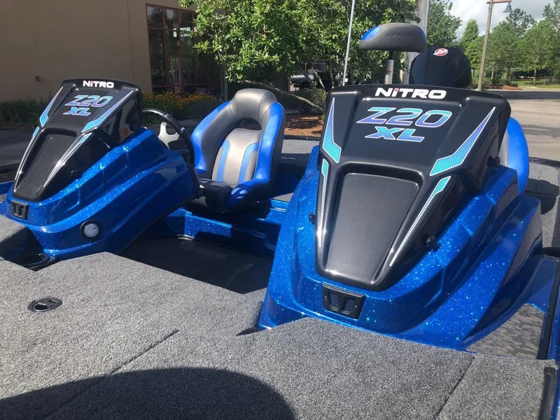 Slide: The Image of 2025 Nitro Z20 XL boat with blue metallic finish and dual seating. - 10