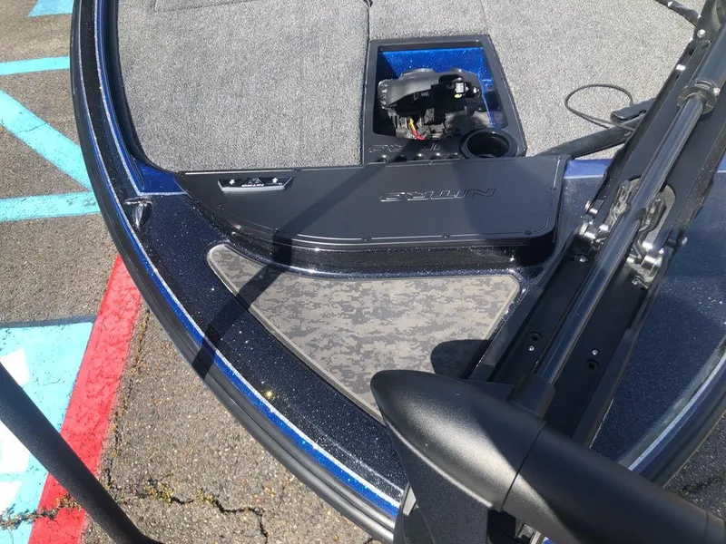 Slide: The Image of 2025 Nitro Z20 XL boat deck with storage compartment and trolling motor. - 8