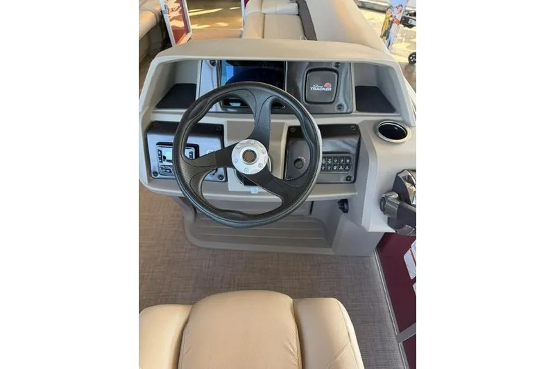 Slide: The Image of Steering console of 2025 Sun Tracker Party Barge 18 DLX pontoon boat. - 14