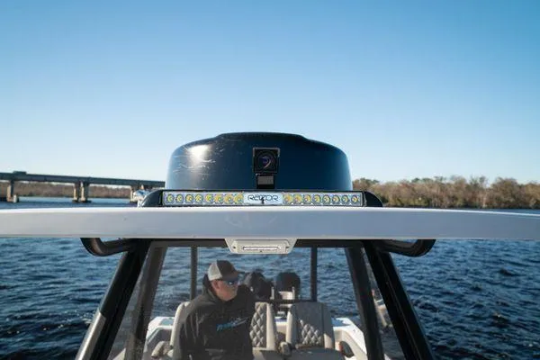 Slide: The Image of 2026 Front Runner 36 cc boat with radar and LED lights on the water. - 8