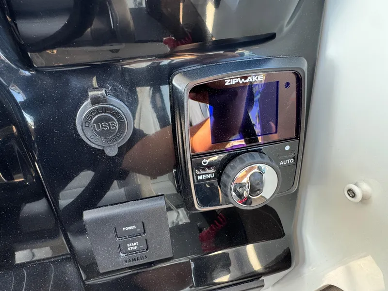 Slide: The Image of Control panel of 2025 Jeanneau NC 795 Series 2 with USB and Zipwake system. - 15