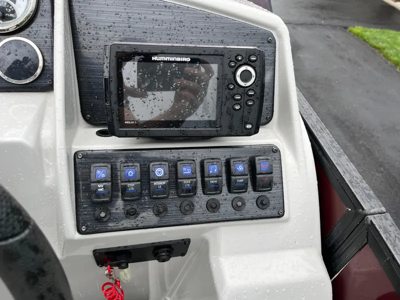 Slide: The Image of Control panel of 2021 Sylvan Mirage X X3 boat with Humminbird fish finder. - 11