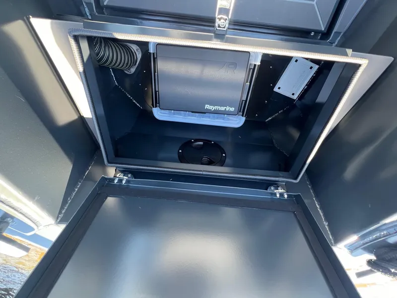 Slide: The Image of 2024 G-Force compartment with Raymarine equipment, showcasing advanced technology and design. - 2