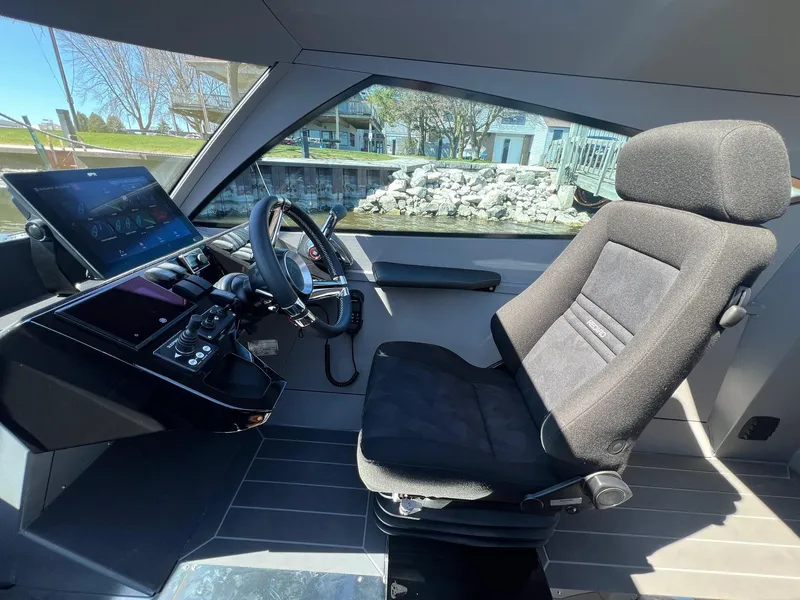 Slide: The Image of 2024 G-Force boat cockpit with modern controls and comfortable seating. - 7