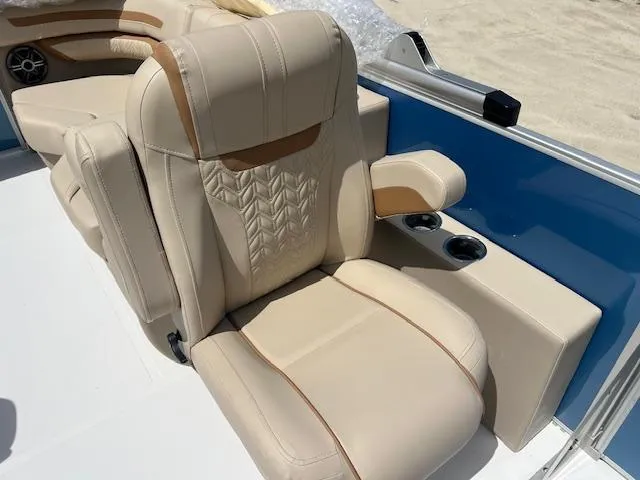 Slide: The Image of Luxurious seating on 2025 Hurricane FunDeck 2360 SBC OB boat, featuring beige upholstery. - 5
