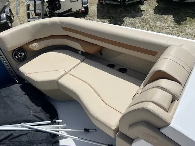 Slide: The Image of Luxurious seating on 2025 Hurricane FunDeck 2360 SBC OB boat, featuring beige upholstery. - 8