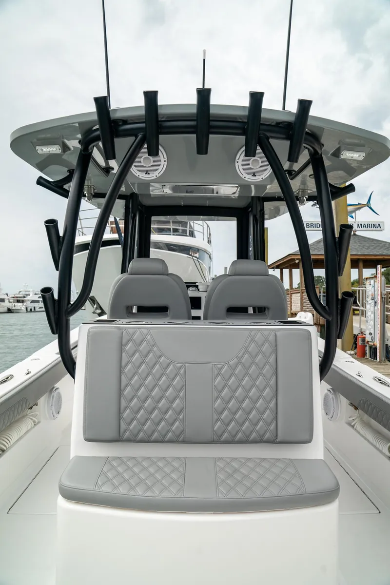 Slide: The Image of 2026 Front Runner 33 CC boat with sleek seating and modern design. - 24