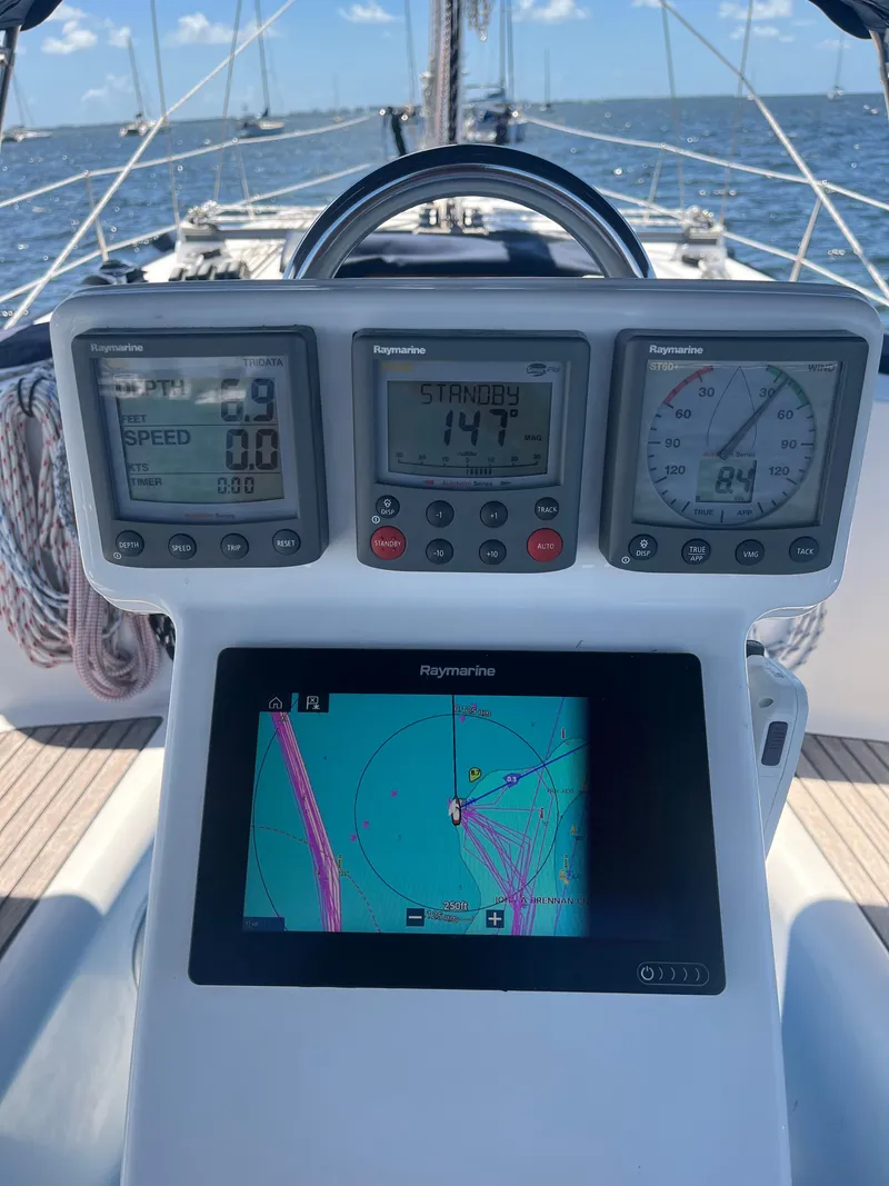 Slide: The Image of Cockpit navigation instruments on a 2007 Beneteau Oceanis Clipper 343 sailboat. - 14