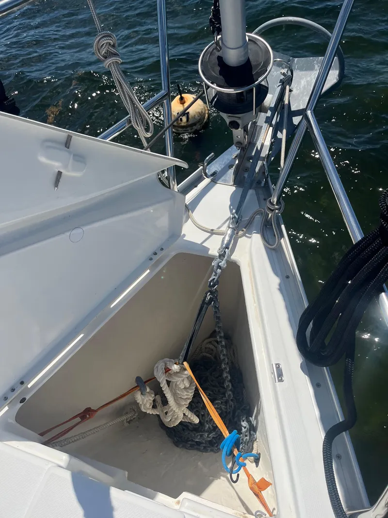 Slide: The Image of Open anchor locker on 2007 Beneteau Oceanis Clipper 343 sailboat, showing ropes and chains. - 20