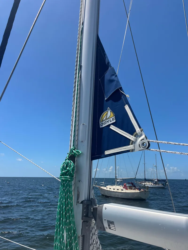 Slide: The Image of Sailboat mast with Doyle sail, Beneteau Oceanis Clipper 343, 2007, on calm sea. - 21