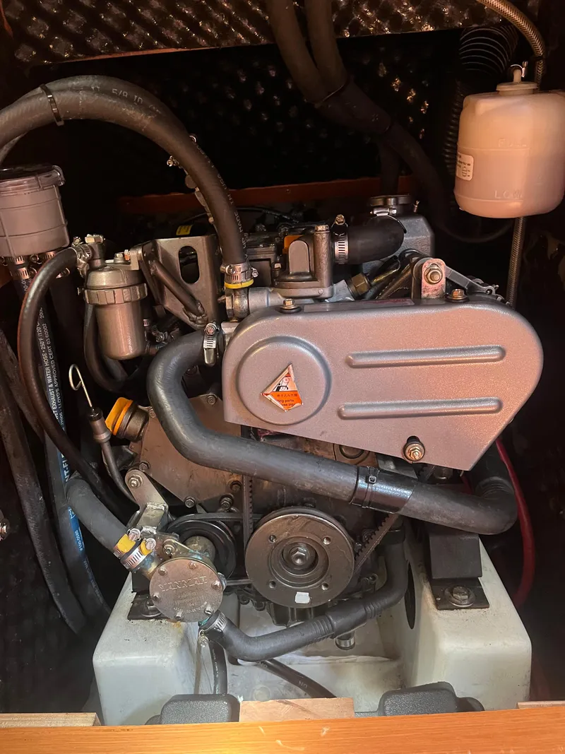 Slide: The Image of Engine of a 2007 Beneteau Oceanis Clipper 343 sailboat, showcasing detailed components. - 26