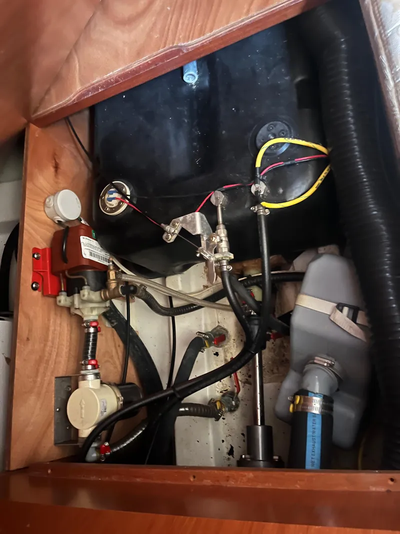 Slide: The Image of Engine compartment of a 2007 Beneteau Oceanis Clipper 343 sailboat, showing wiring and components. - 29