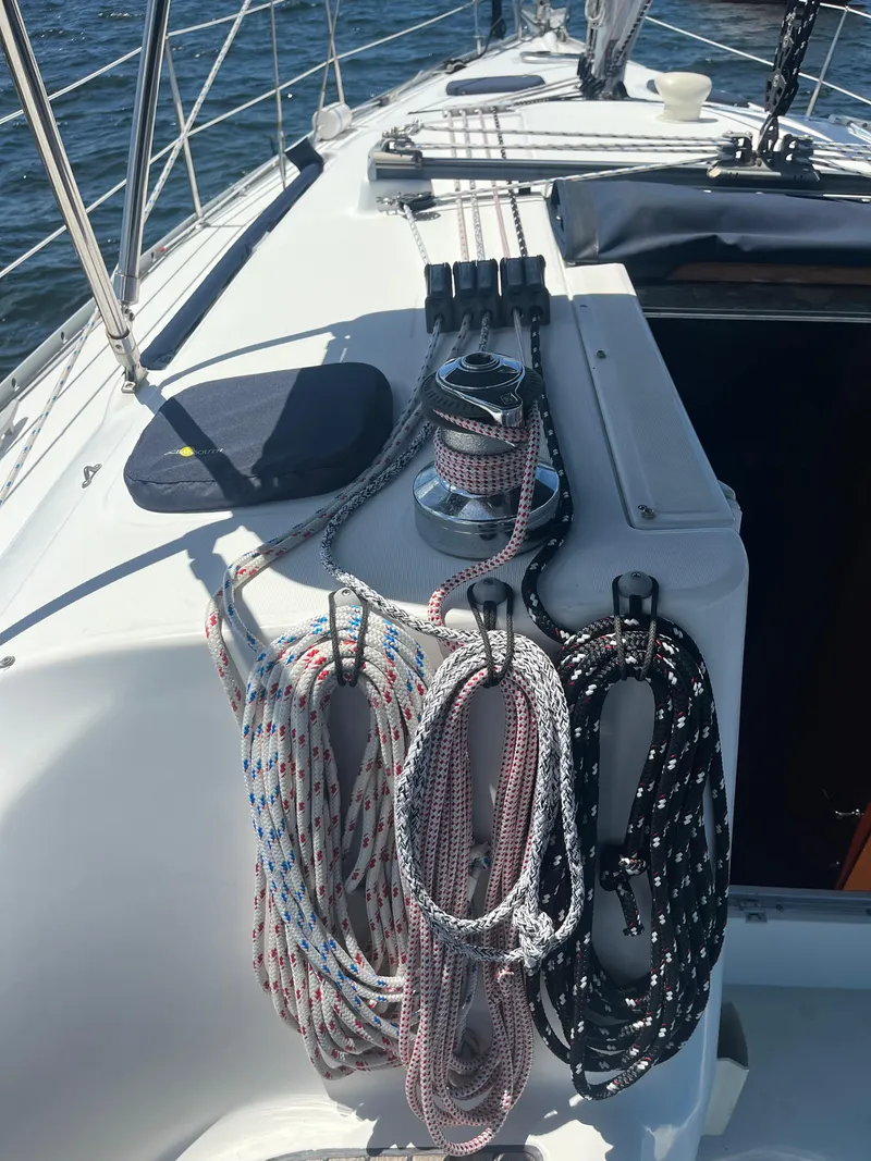 Slide: The Image of Deck of 2007 Beneteau Oceanis Clipper 343 with ropes and winch. - 37