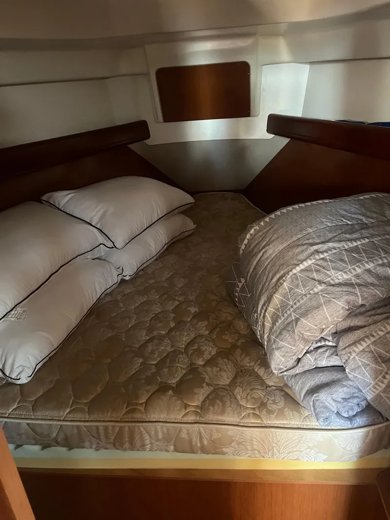 Slide: The Image of Cozy cabin bed in 2007 Beneteau Oceanis Clipper 343 sailboat. - 47
