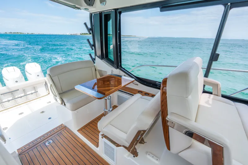 Slide: The Image of Interior of 2026 Boston Whaler 405 Conquest with ocean view. - 11