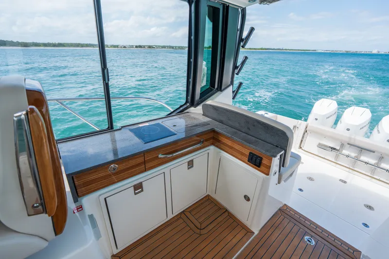 Slide: The Image of Interior of 2026 Boston Whaler 405 Conquest with ocean view. - 13