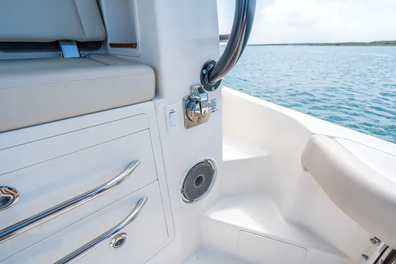 Slide: The Image of Interior of 2026 Boston Whaler 405 Conquest with seat and speaker. - 19