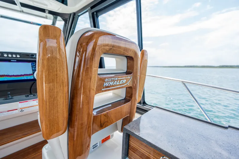 Slide: The Image of Interior of 2026 Boston Whaler 405 Conquest with wood accents. - 20