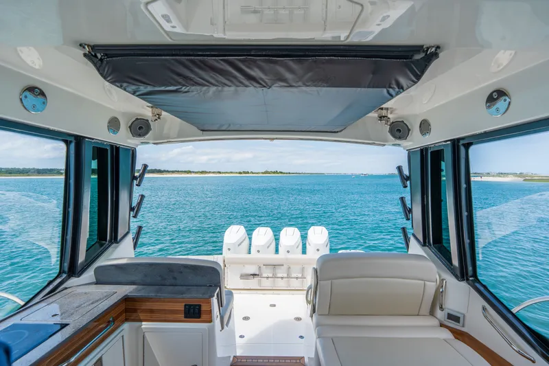 Slide: The Image of Interior view of 2026 Boston Whaler 405 Conquest on open sea. - 24
