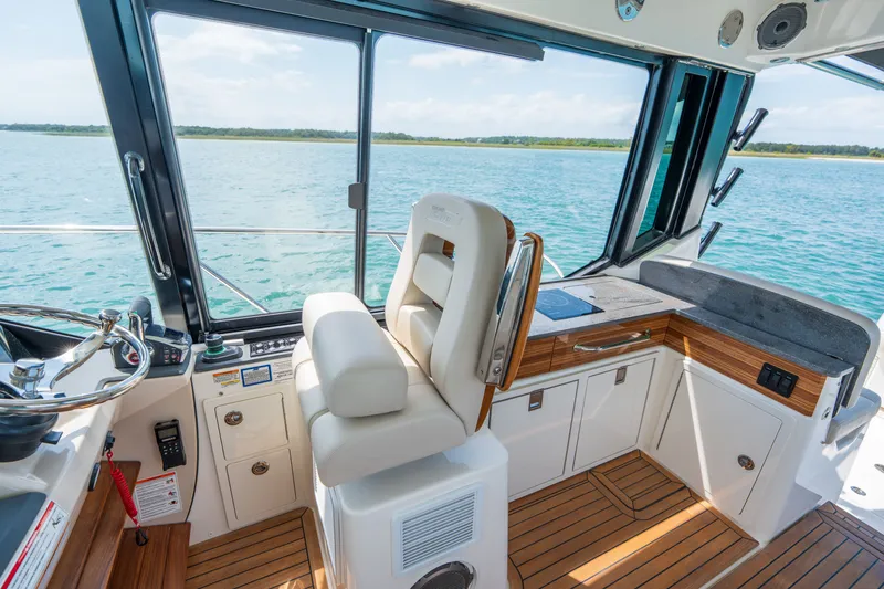 Slide: The Image of Interior of 2026 Boston Whaler 405 Conquest with ocean view. - 29