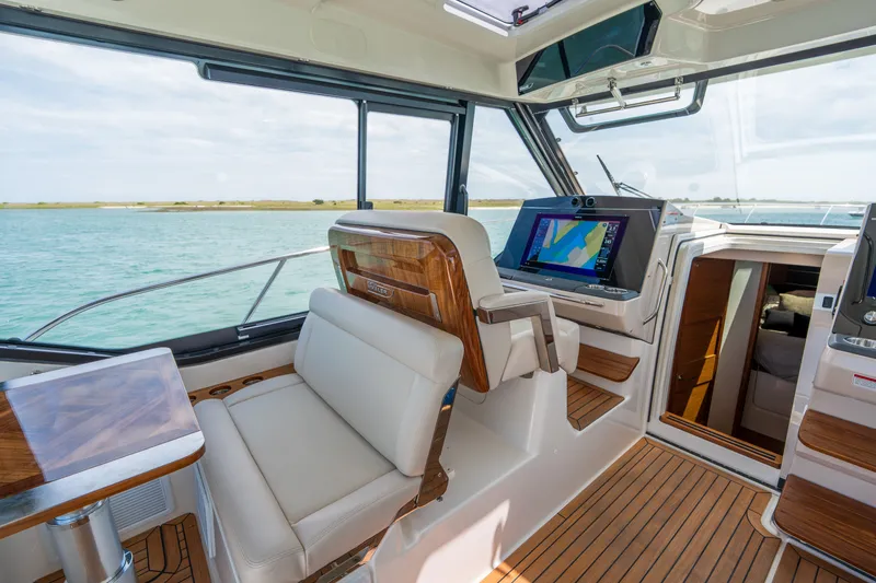 Slide: The Image of Interior of 2026 Boston Whaler 405 Conquest with modern navigation system. - 32