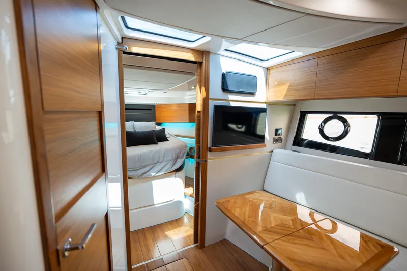 Slide: The Image of Interior of 2026 Boston Whaler 405 Conquest with modern amenities. - 42