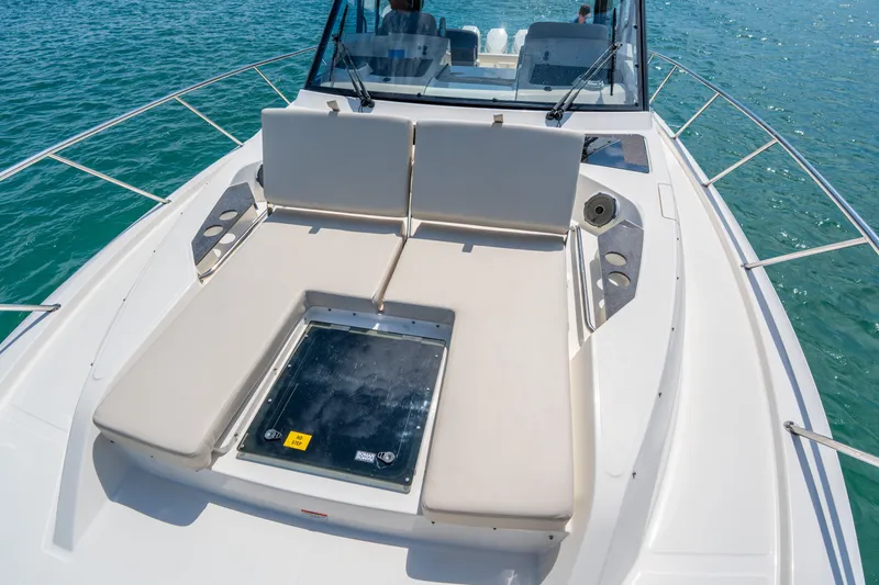 Slide: The Image of Boston Whaler 405 Conquest 2026 with luxurious sun deck on open water. - 47