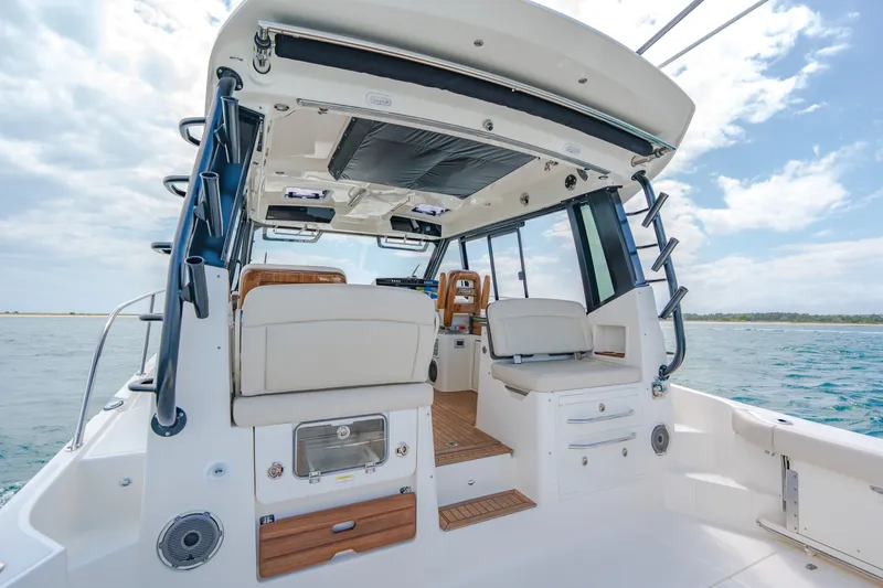 Slide: The Image of Interior of 2026 Boston Whaler 405 Conquest on open sea. - 8