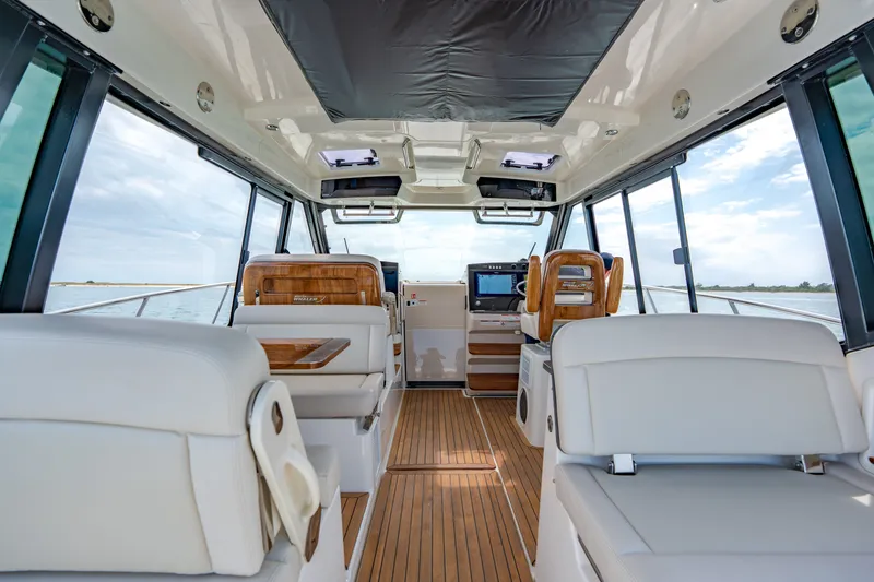 Slide: The Image of Interior of 2026 Boston Whaler 405 Conquest with luxurious design. - 9