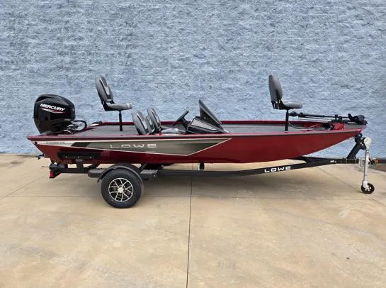 The Image of 2025 Lowe Stinger 175C fishing boat with Mercury engine on trailer. - 1