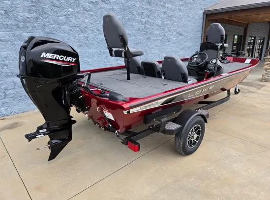 Slide: The Image of 2025 Lowe Stinger 175C fishing boat with Mercury outboard motor, parked on concrete. - 10