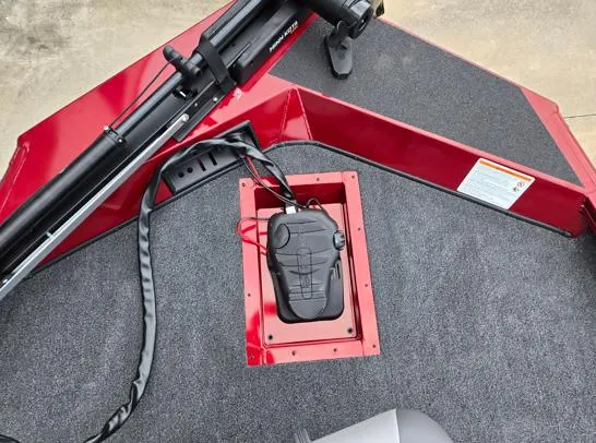 Slide: The Image of 2025 Lowe Stinger 175C boat deck with trolling motor and foot pedal. - 3