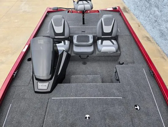 Slide: The Image of 2025 Lowe Stinger 175C boat interior with dual seats and carpeted deck. - 5