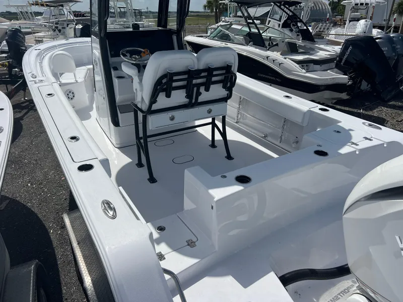 Slide: The Image of 2025 Sportsman Open 232 Center Console boat with spacious deck and seating. - 5