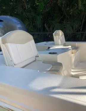 Slide: The Image of 2016 Robalo 206 Cayman boat interior with seating and console. - 11
