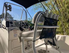 Slide: The Image of 2016 Robalo 206 Cayman boat interior with steering wheel and seating. - 5