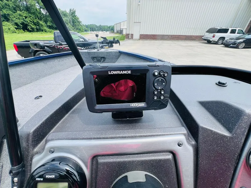 Slide: The Image of 2023 Tracker Pro Guide V-175 WT boat with Lowrance fish finder on the dashboard. - 15