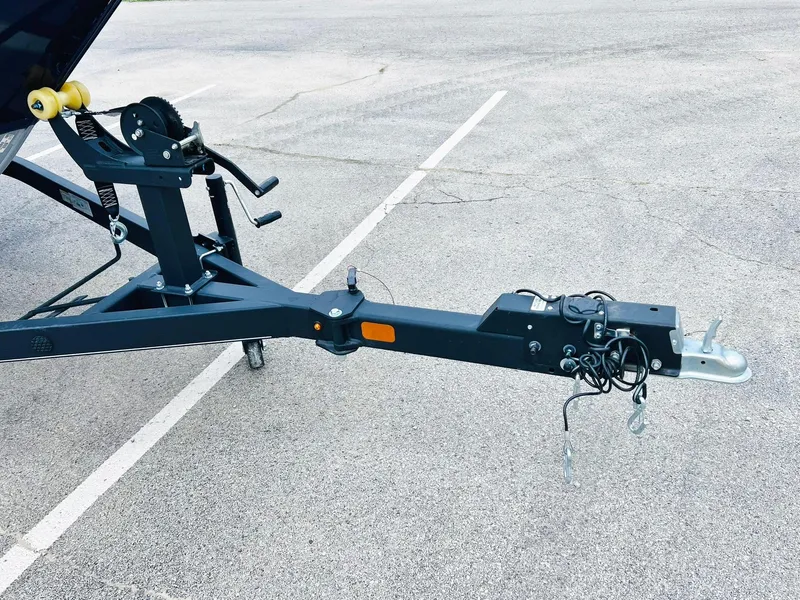 Slide: The Image of Trailer hitch of 2023 Tracker Pro Guide V-175 WT boat on asphalt parking lot. - 43