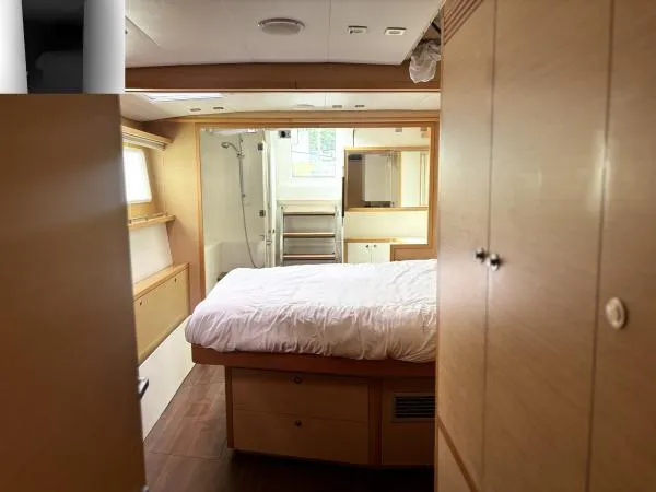 Slide: The Image of Luxurious interior of 2012 Lagoon 560 yacht with cozy bedroom and modern design. - 16