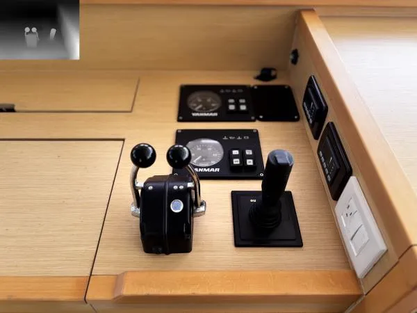 Slide: The Image of Control panel of a 2012 Lagoon 560 yacht with throttle and joystick. - 8