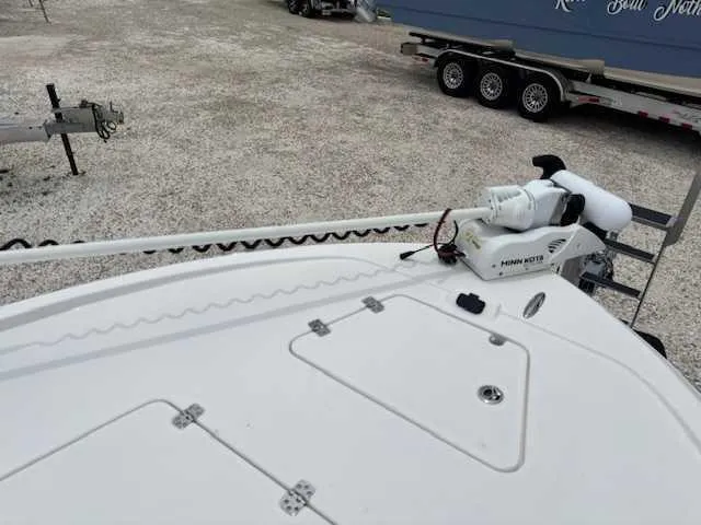 Slide: The Image of 2022 Caymas 28 Twin boat deck with Minn Kota trolling motor. - 10