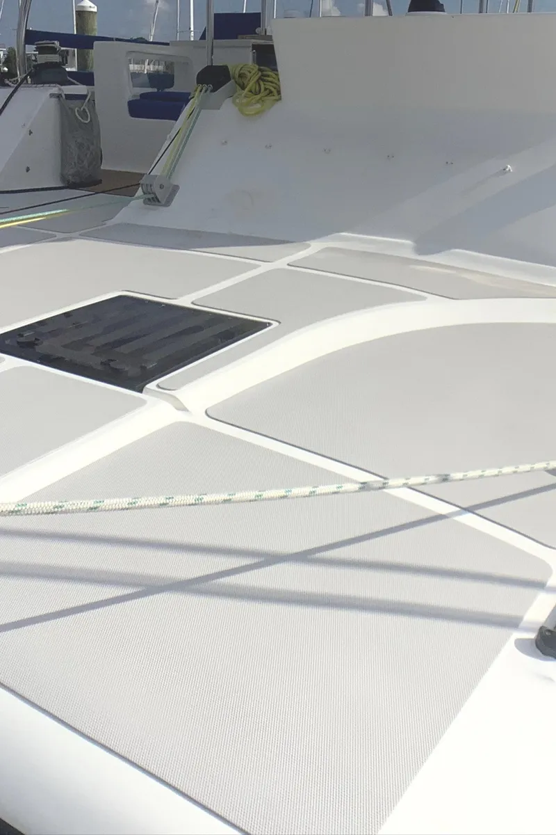 Slide: The Image of 2021 Royal Cape Catamarans Majestic 570 Flybridge deck with sleek design and modern features. - 17