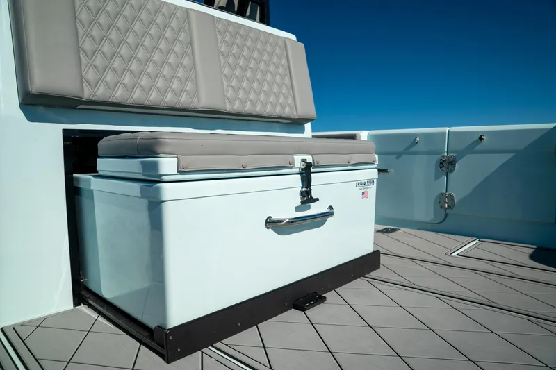 Slide: The Image of 2026 Front Runner 39 CC boat interior with cushioned storage bench and sleek design. - 12